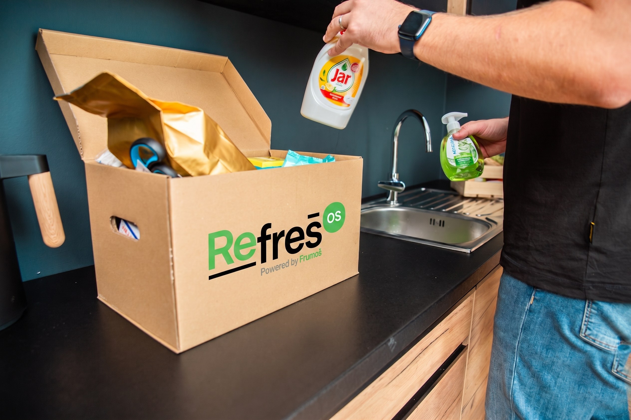 A RefrešOS agent cleaning an office kitchen